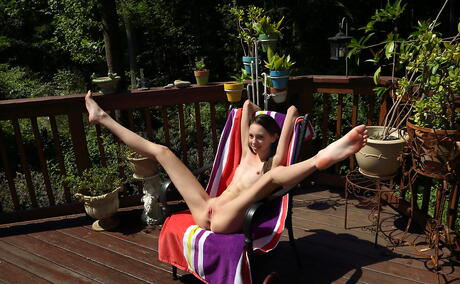 Gracile american brunette teen Aria Haze baring tiny tits and playing with dildo outdoor